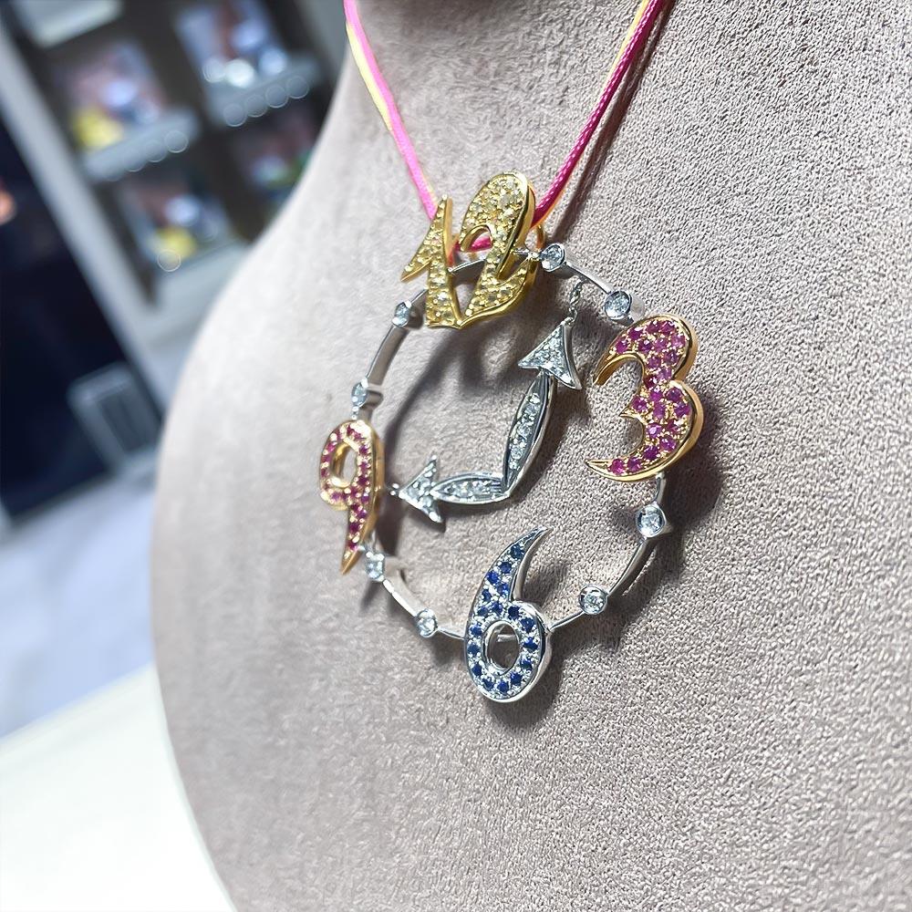  Ciondolo orologio oro bianco zaffiri 1,55ct diamanti 0,23ct - LOCMAN