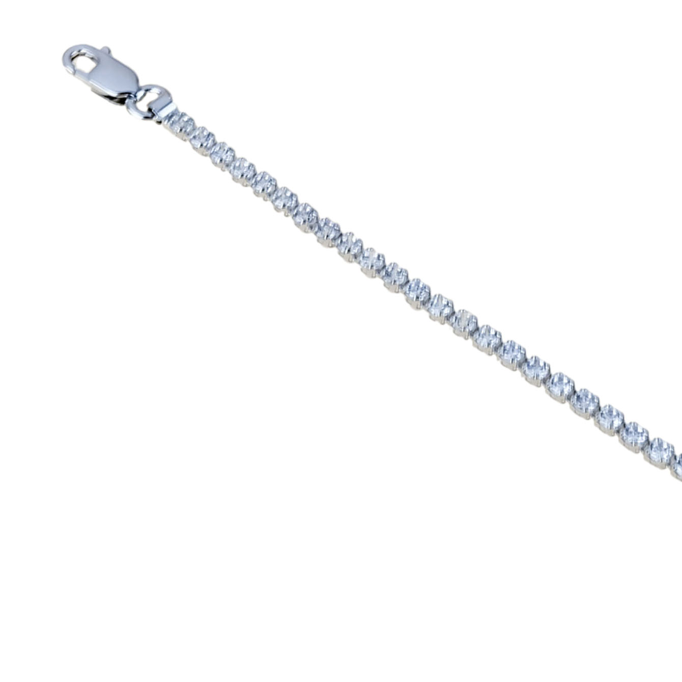 Bracciale con zirconi in oro bianco 18kt.