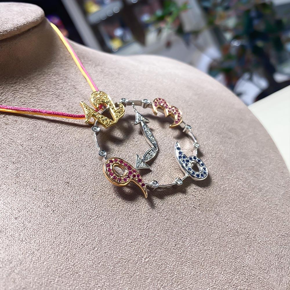  Ciondolo orologio oro bianco zaffiri 1,55ct diamanti 0,23ct - LOCMAN