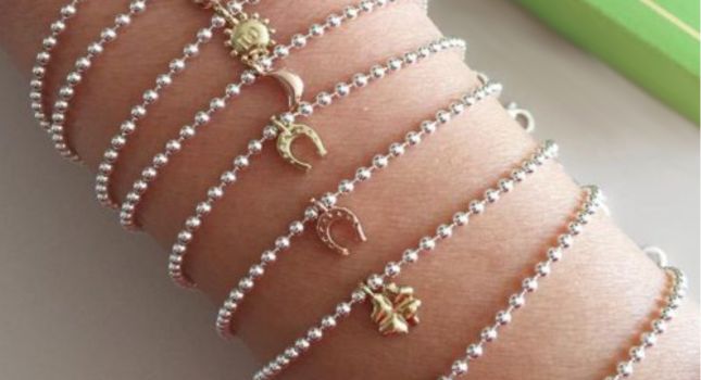 bracciale componibile Dodo Mariani con charms in argento e oro